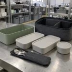 Convertible modular bento system with two removable trays, utensils and divider carry case