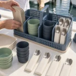 Four-person tableware loaded into the separator bays of a deck caddy