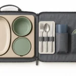 Open folio with removable cradle utensil loops tumbler pocket and lid pocket