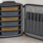 Six meal boxes and cutlery sleeves secured in a graphite insulated carrier
