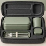 Stackable office lunch set secured inside fitted carry case compartments