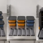 Meal boxes grouped before loading into the six shelf insulated carrier