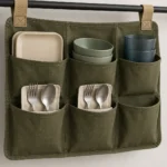 Two-person campervan dining kit secured in six organizer pockets