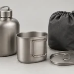 Custom titanium canteen cup set with nesting cup, fitted lid and charcoal carry pouch