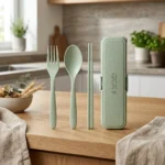 Eco-friendly wheat straw bio-composite portable flatware set in pastel sage green with snap travel case