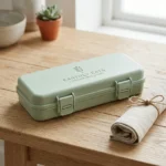 Pastel sage green wheat straw portable cutlery case with secure snap latches